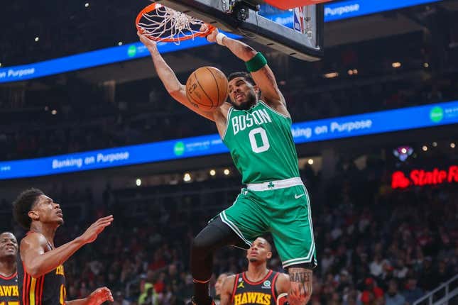 Apr 27, 2023; Atlanta, Georgia, USA; Boston Celtics forward Jayson Tatum (0) dunks the ball against the Atlanta Hawks in the first quarter during game six of the 2023 NBA playoffs at State Farm Arena.