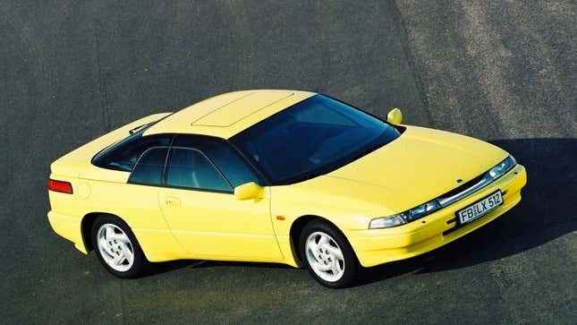 A photo of a yellow Subaru SVX. 