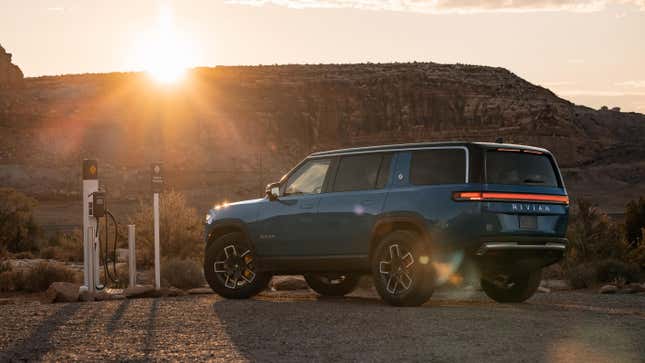 A blue Rivian R1S EV SUV.