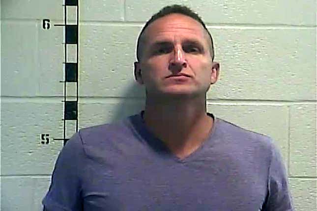 In this handout photo provided by the Shelby County Detention Center, former Louisville, Kentucky detective Brett Hankison poses for a mug shot on September 23, 2020 in Louisville, Kentucky. Hankison was charged with three counts of wanton endangerment in connection to the night Breonna Taylor was killed by police.