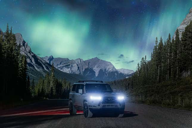 Front 3/4 view of a Lexus GX 550 with the northern lights in the background