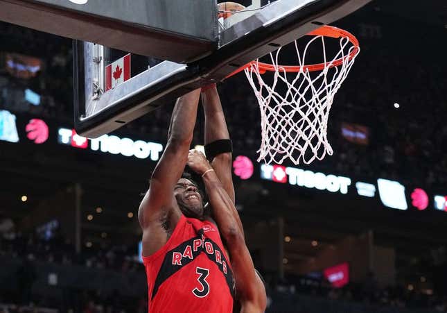 Nov 19, 2023; Toronto, Ontario, CAN; Toronto Raptors forward O.G. Anunoby (3) drives to the basket as Detroit Pistons guard Alec Burks (14) try to block during the second quarter at Scotiabank Arena.