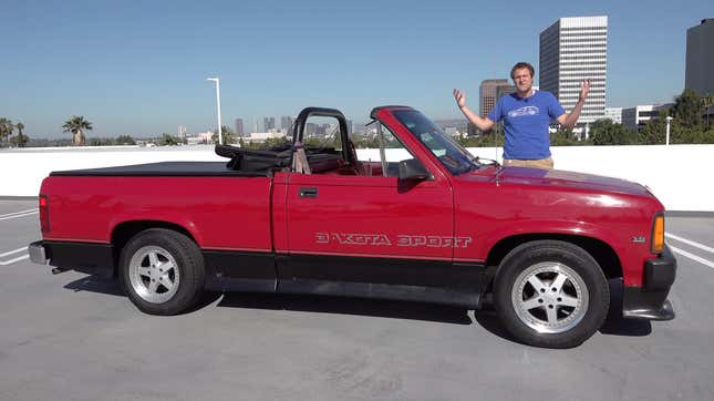 A red and black Dodge Dakota convertible with the roof down in a Doug DeMuro video