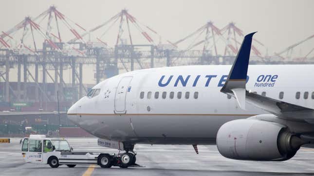 A United Airlines airplane at Terminal A at Newark Liberty International Airport (EWR) in Newark, New Jersey, US, on Thursday, Jan. 12, 2023. The new terminal will see an estimated 14 million passengers annually with 33 common-use gates servicing Air Canada, American Airlines, JetBlue and United Airlines, according to the authority. 