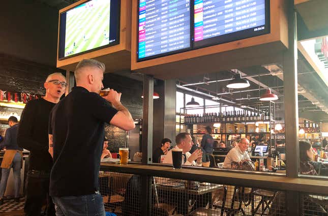 embers of the public enjoy an early morning drink at a bar in Gatwick Airport on November 8, 2018 in Londo,England.