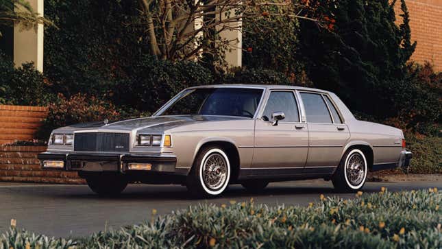 Une photo d’une berline Buick LeSabre grise/ 