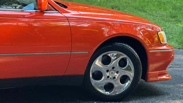 Image for article titled This Nacho Cheese Orange Infiniti Q45 Is The Only Infiniti Worth Buying