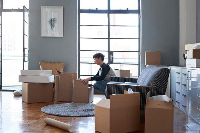 Woman packing boxes