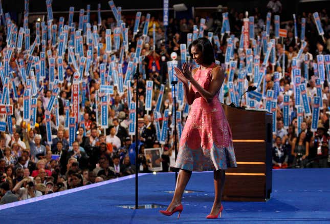 U.S. first lady Michelle Obama applauds after concluding her address to delegates during the first session of the Democratic National Convention in Charlotte, North Carolina, September 4, 2012. REUTERS/Jessica Rinaldi (UNITED STATES - Tags: POLITICS ELECTIONS) - RTR37HZ0