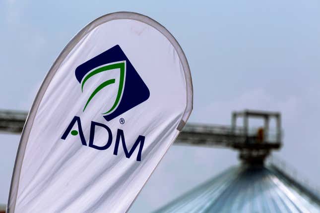 FILE - In this Monday, Aug. 31, 2015, photo, the Archer Daniels Midland Company logo is seen at the Farm Progress Show in Decatur, Ill. An accounting investigation is under way at Archer Daniels Midland and the top financial executive at the agribusiness giant has been placed on administrative leave. The company postponed the release of its annual and quarterly financial reports that were scheduled for Tuesday, Jan. 23, 2024, and shares of the Chicago company tumbled 12% before the opening bell Monday.(AP Photo/Seth Perlman, File)