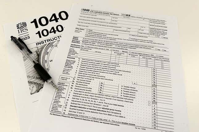 FILE - An Internal Revenue Service 2023 1040 tax form and instructions are shown on Jan. 26, 2024 in New York. It&#39;s tax season in the U.S., and for many people, filing tax returns can be a daunting task that&#39;s often left until the last minute. (AP Photo/Peter Morgan, File)