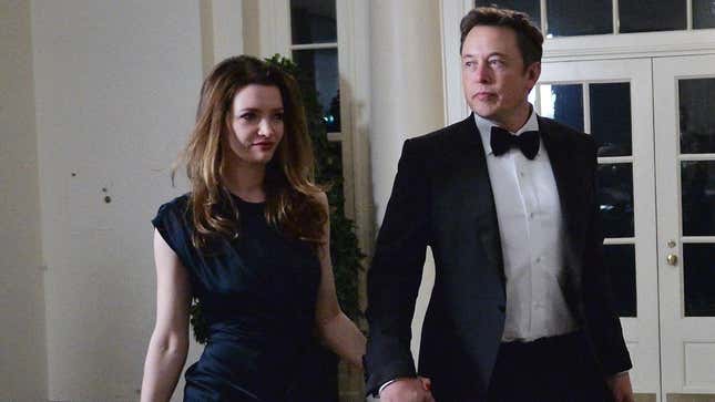 Elon Musk holds his ex-wife Talulah Riley's hand.