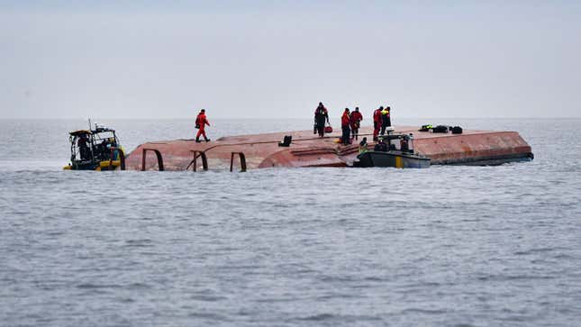 The hull of a capsized cargo ship 