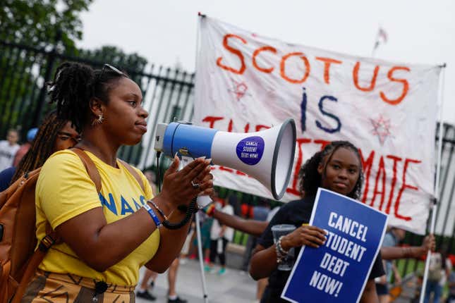 WASHINGTON, DC - JUNE 30: Cici Gordon with the NAACP leads student debt relief activists in a chant in front of the White House after the U.S. Supreme Court struck down President Biden’s student debt relief program on June 30, 2023 in Washington, DC.