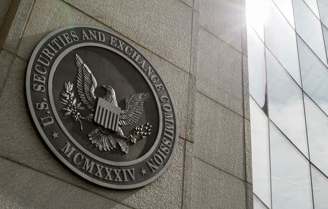 FILE - The seal of the U.S. Securities and Exchange Commission is affixed on a wall at SEC headquarters, June 19, 2015, in Washington. On Thursday, Feb. 22, 2024, a Houston man pleaded guilty to securities fraud for trading on inside information from his wife&#39;s business conversations while both were working from home. (AP Photo/Andrew Harnik, File)