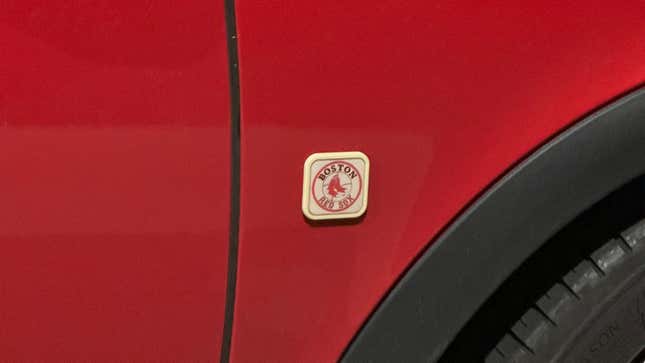 Front fender badge of a red Boston Red Sox Special Edition Volvo C30