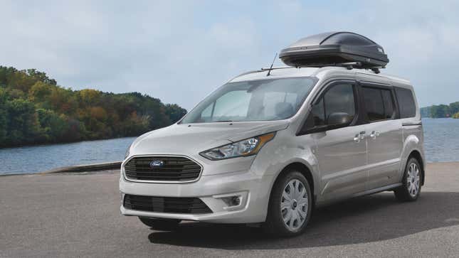 A photo of a beige Ford Transit Connect van. 