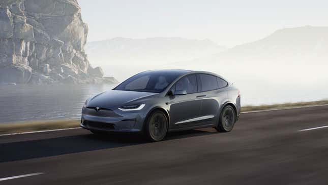 A photo of a grey tesla Model X electric car. 