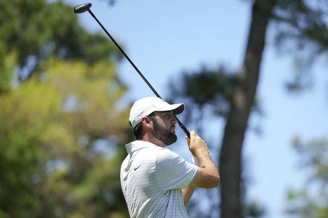 Apr 18, 2024; Hilton Head, South Carolina, USA; Scottie Scheffler plays his shot from the eighth tee during the first round of the RBC Heritage golf tournament.