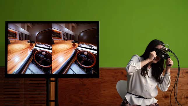 A woman tests the VR headset, while a TV shows the footage of a car she sees inside the headset.