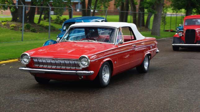 A red 1963 Dodge Dart GT Convertible