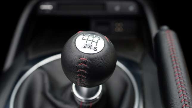 A photo of a manual gear shifter. 