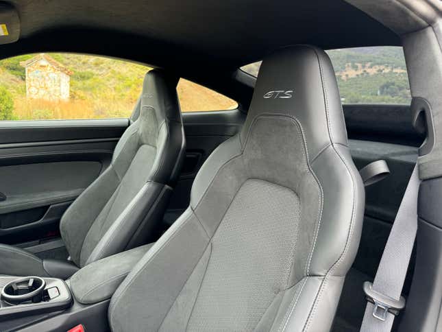 Front seats of a grey 2025 Porsche 911 Carrera GTS