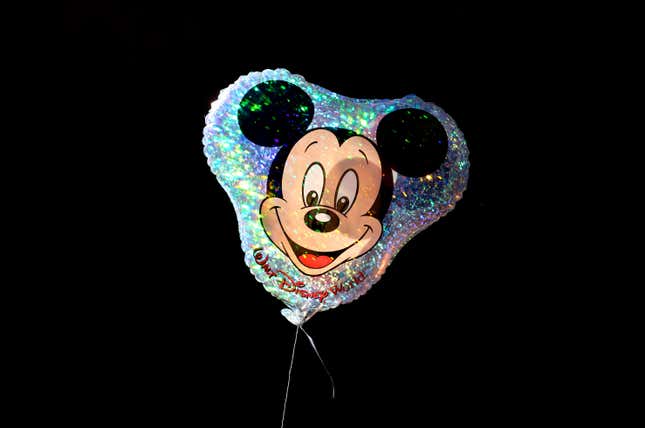 A Mickey Mouse balloon flies at the Magic Kingdom Park at Walt Disney World on May 31, 2024, in Orlando, Florida.