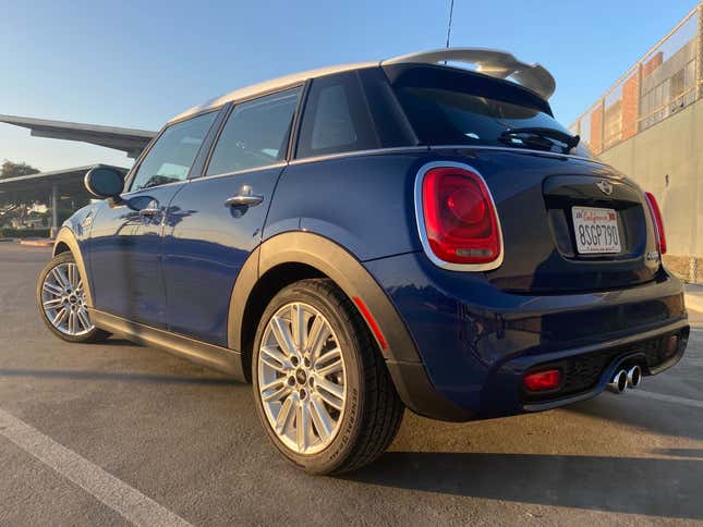 A rear 3/4 shot of my 2017 Mini Cooper S 5-door hatchback parked in a parking lot