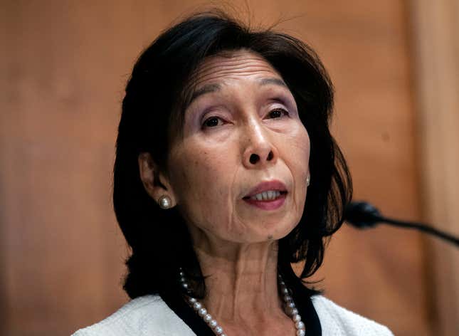 Nellie Liang speaking into a small microphone