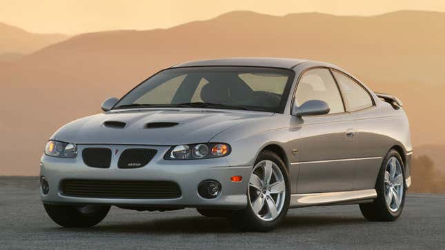 A photo of a silver Pontiac GTO. 