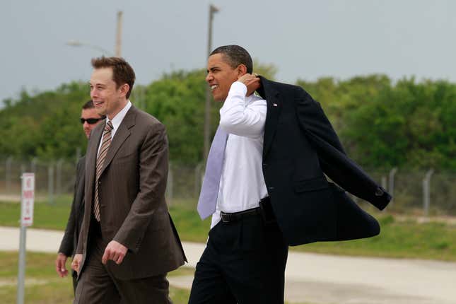 President Barack Obama walks to look at the Falcon 9 launch vehicle with  SpaceX CEO Elon Musk at Kennedy Space Center Thursday, April 15, 2010.