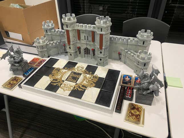 The 3D-printed Queen's Blood board used by the Square Enix team to refine the game.