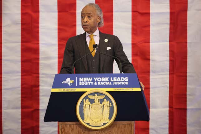 NEW YORK, NEW YORK - DECEMBER 19: Founder and president of the National Action Network Rev. Al Sharpton speaks during a press conference and signing of legislation creating a commission for the study of reparations in New York on December 19, 2023 in New York City. Gov. Hochul was joined by Rev. Al Sharpton, various members of NY government leadership and influential community members six months after state lawmakers passed the bill and three years after California became the first state to create a reparations task force. The bill creates a nine-member commission that would study the effects of slavery in the state and make non-binding recommendations on reparations. 