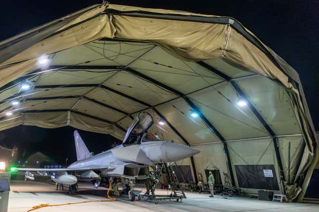 In this image provided on Friday Jan. 12, 2024 by the UK Ministry of Defence an RAF Typhoon aircraft returns to base at RAF Akrotiri in Cyprus, after striking targets in Yemen. The U.S. and British militaries bombed more than a dozen sites used by the Iranian-backed Houthis in Yemen late on Thursday Jan. 11, in a massive retaliatory strike using warship- and submarine-launched Tomahawk missiles and fighter jets, U.S. officials said. (Sgt Lee Goddard, UK Ministry of Defence via AP)