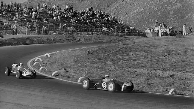 Stirling Moss leads American racer Pete Lovely at the 1960 Formula 1 United States Grand Prix.