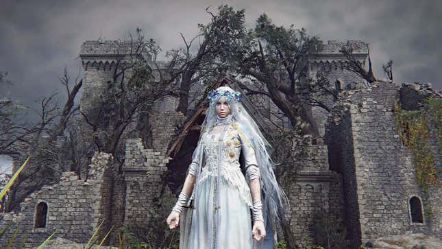 A young woman in a fancy dress stands before a crumbling building.
