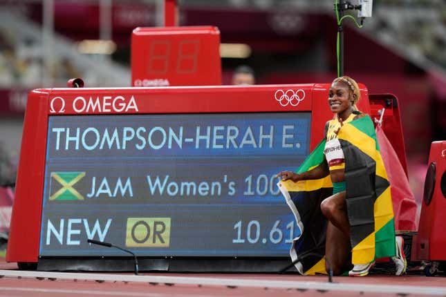 Elaine Thompson-Herah, of Jamaica, celebrates after winning the women’s 100-meter final at the 2020 Summer Olympics, Saturday, July 31, 2021, in Tokyo.