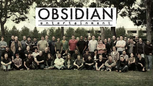 A photo of the Obsidian developers who worked on Fallout New Vegas. 