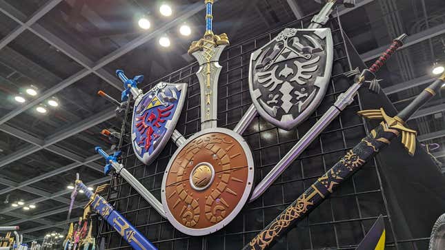 Zelda swords and shields are on display at Comic Con.