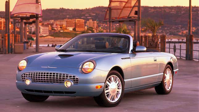 A photo of a blue Ford Thunderbird convertible. 