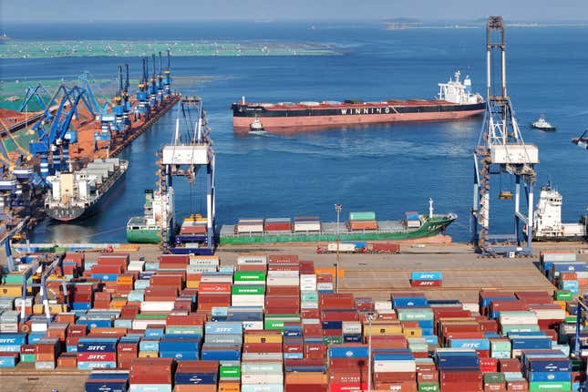 FILE - Containers wait to be transported on a dockyard in Yantai in eastern China&#39;s Shandong province on Aug. 6, 2023. China’s exports declined at a slower pace in August, even as the world’s second biggest economy remains under pressure amid weaker demand both domestically and abroad, according to customs data Thursday, Sept. 7, 2023. (Chinatopix via AP, File)