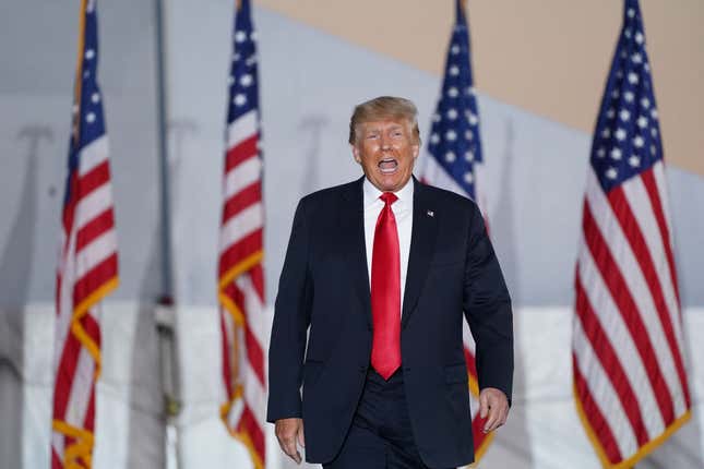 PERRY, GA - SEPTEMBER 25: Former US President Donald Trump greets the crowd at a rally on September 25, 2021, in Perry, Georgia.