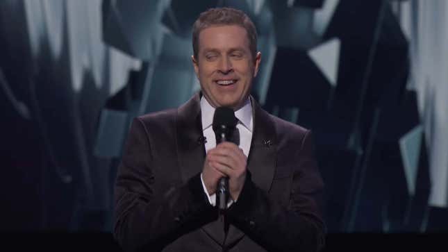 An image shows host Geoff Keighley smiling awkwardly. 