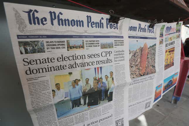 Local newspapers the Phnom Penh Post, left, and Khmer Times, right, are for sale at a newspaper&#39;s stand on a sidewalk near Monument Independence in Phnom Penh, Cambodia, Friday, Mach 1, 2024. The Phnom Penh Post, a newspaper founded in 1992 as Cambodia sought to re-establish stability and democracy after decades of war and unrest, announced Friday that it will cease publishing a print edition this month, the latest blow to the country&#39;s dwindling independent media. (AP Photo/Heng Sinith)