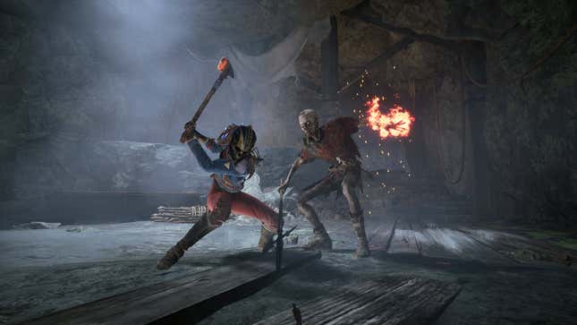 Nor strikes at a zombie with her ax.