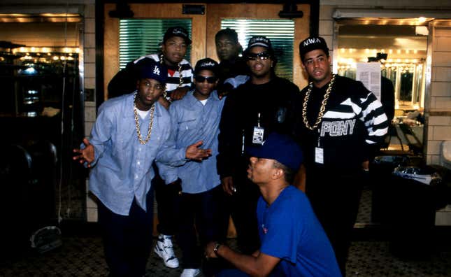 Rapper and producer Dr. Dre (Andre Romelle Young), Laylaw (Larry Goodman) of Above The Law, (rear) MC Ren (Lorenzo Jerald Patterson), Eazy-E (Eric Lynn Wright), Ice Cube (O’Shea Jackson) and DJ Yella (Antoine Carraby) of N.W.A. poses for photos with rapper The D.O.C. (Tracy Lynn Curry) (front) after their performances during the ‘Straight Outta Compton’ tour at the Mecca Arena in Milwaukee, Wisconsin in June 1989. 