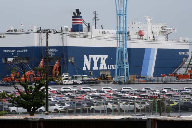 FILE - Cars for export park at a port in Yokohama, near Tokyo, on July 6, 2020. Japan&#39;s exports climbed 4.3% in September from a year earlier as shipments of vehicles, machinery and electronics rose while imports of oil and gas fell sharply, the government said Thursday, Oct. 19, 2023. (AP Photo/Koji Sasahara, File)