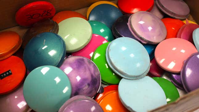 A photo of a box full of color samples for P50 Cars.
