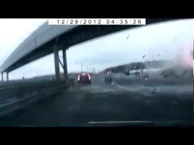 Russian Dash Cam Captures Moscow Plane Crashing Into Highway
